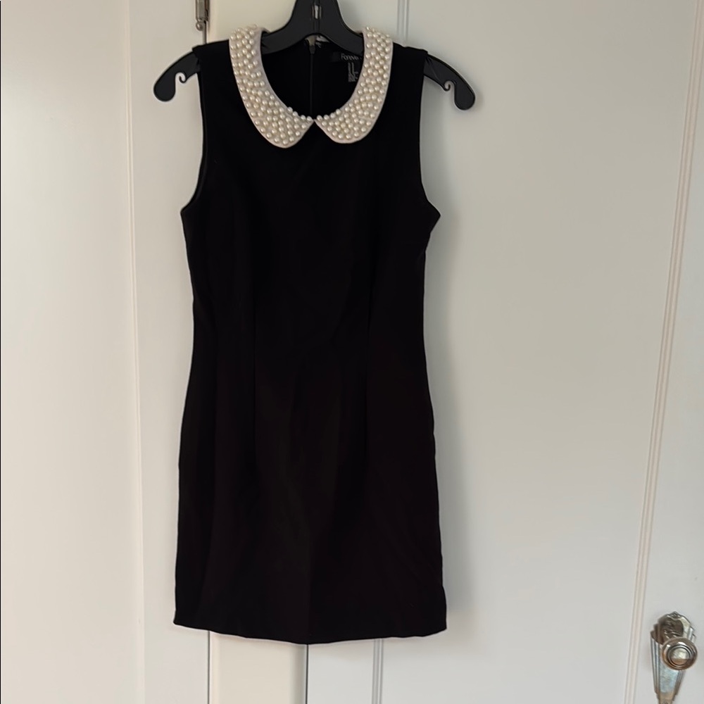 Elegant Black Dress with Pearl Collar